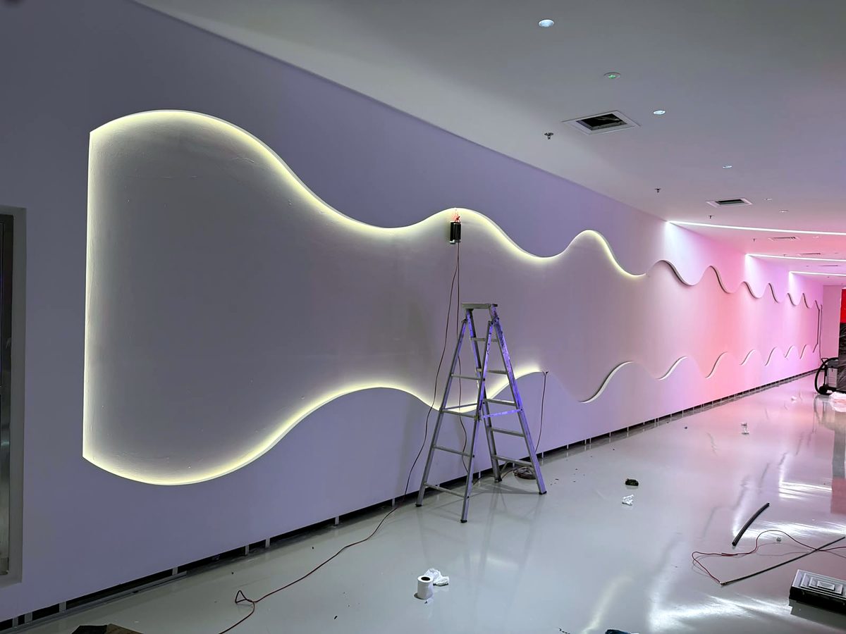 Curved LED feature wall lighting fitted by Mizan's team